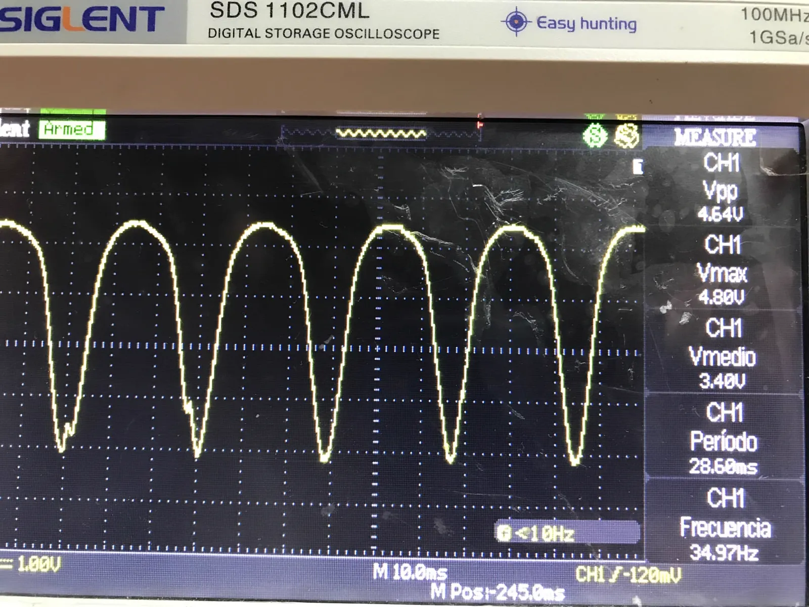 Oscilloscope screen showing the measured braking waveform at 34.97 Hz with peak and mean voltage readings